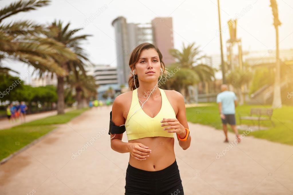 young woman running outdoors