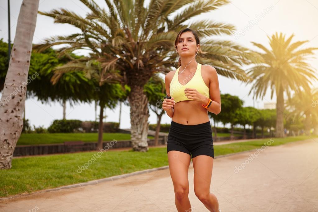 young woman running outdoors