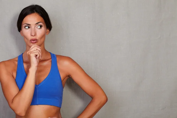 Thoughtful sporty woman — Stock Photo, Image