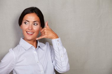 Businesswoman gesturing call