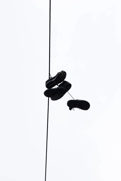 Silhouette Shoes Hanging Electricity Cable Colombian Slum Symbol Drug Sales — Stock Photo, Image