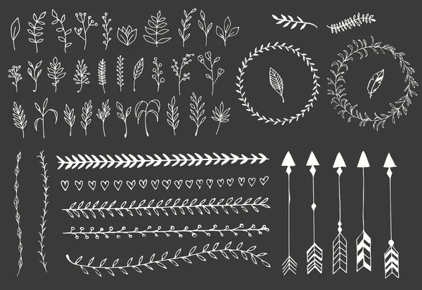 Hand drawn vintage arrows, feathers, dividers and floral elements — Stock Vector