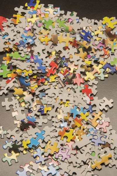 Mehrfarbige Puzzleteile — Stockfoto