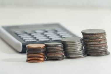Discover how using coins and a calculator can boost your savings, improve budgeting, and enhance your personal finance strategy for smarter money management