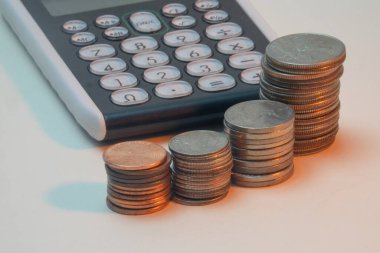 Discover how using coins and a calculator can boost your savings, improve budgeting, and enhance your personal finance strategy for smarter money management