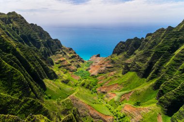 Aerial landscape view of cliffs and green valley, Kauai clipart