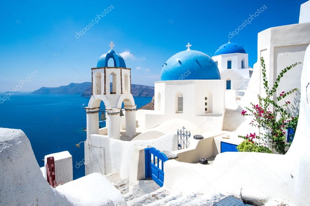 Scenic view of white houses and blue domes on Santorini