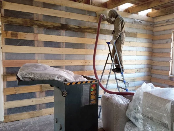 Wall insulation with cellulose insulation. Blowing into the walls through a hose — Stock Photo, Image