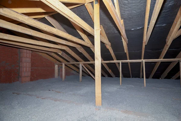 The attic has cellulose insulation. Made from recycled paper — Stock Photo, Image