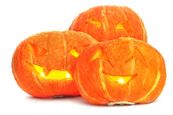 Glühende Halloween-Kürbisse isoliert auf weißem Hintergrund — Stockfoto