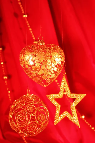 Christmas decor on red — Stockfoto