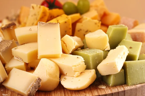 Cut cheese background — Stock Photo, Image