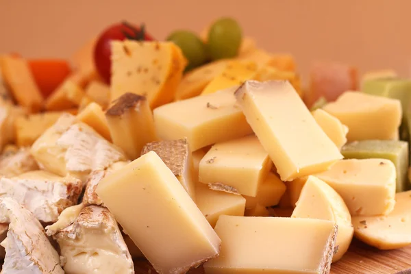 Cut cheese background — Stock Photo, Image