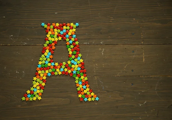 Letter A made with candy — Stock Photo, Image