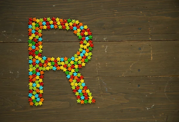 Letter R made with candy — Stock Photo, Image