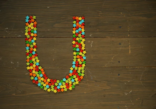 Letter U made with candy — Stock Photo, Image