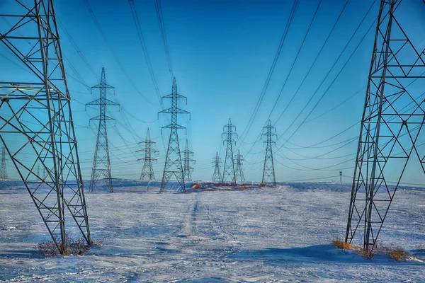 Group of pylons in a blue sky — Stock Photo, Image