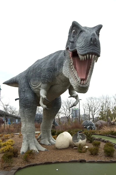 T-Rex with baby in eggs — Stock Photo, Image