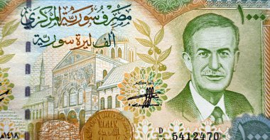 Suriye Başkanı Başer Hafez el Esad 'ın bir banknottaki portresi