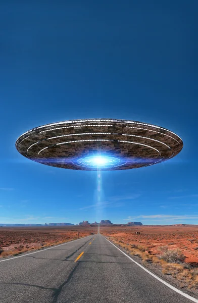Ufo over desert highway — Stock Photo, Image
