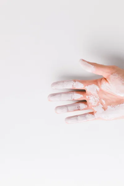 White painted hand over white background. — Stock Photo, Image