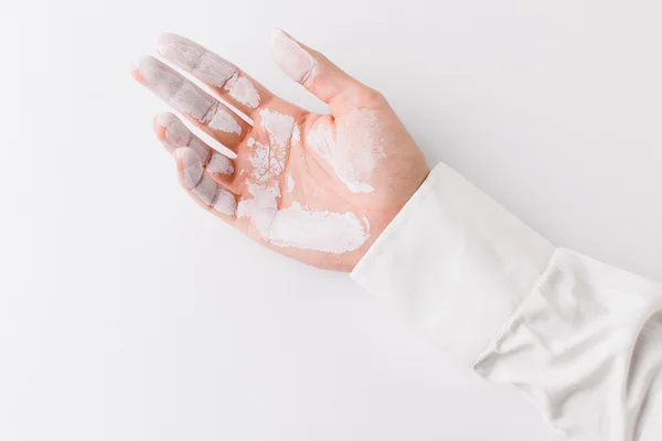 Mano pintada blanca sobre fondo blanco . — Foto de Stock