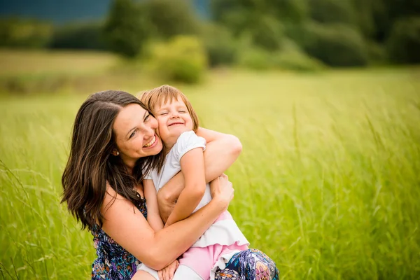 Mother and child hugging — Stock Photo, Image