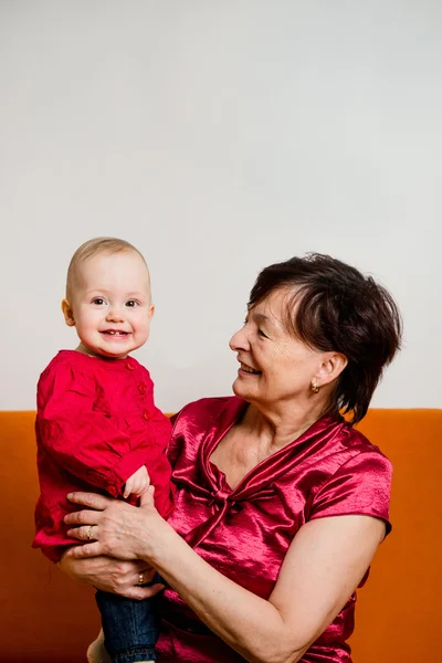 With grandchild - happy retirement — Stock Photo, Image