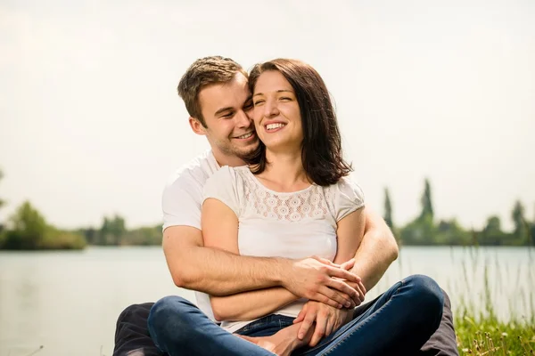 Young happy couple in nature — Stock Photo, Image