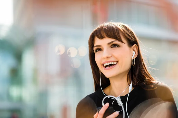 Woman calling phone in street Royalty Free Stock Images