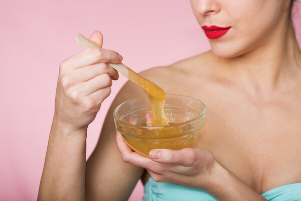 Sugaring beauty treatment