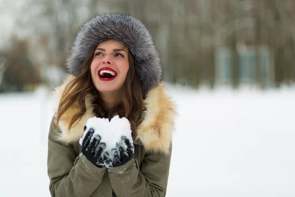 Beautiful woman in winter coat and fur hat — Stock Photo, Image