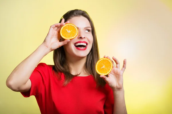 Woman with oranges Stock Picture