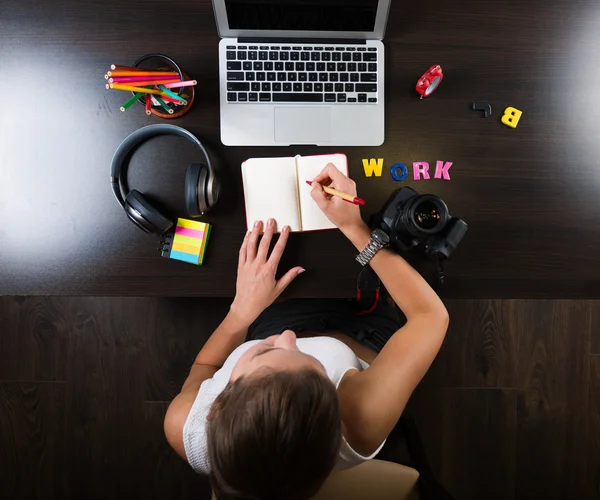 Woman working at creative workplace — Stock Photo, Image