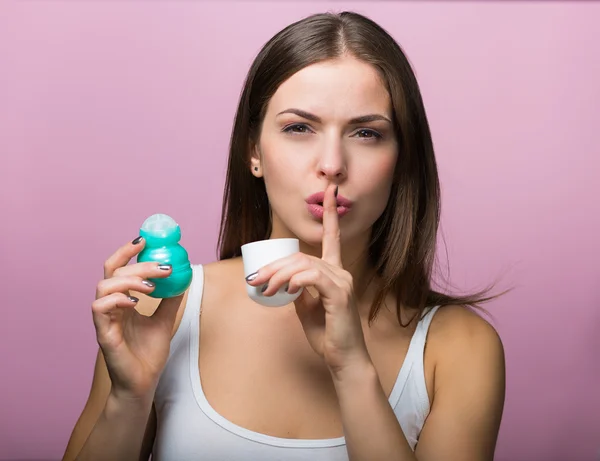 Woman with a deodorant — Stock Photo, Image