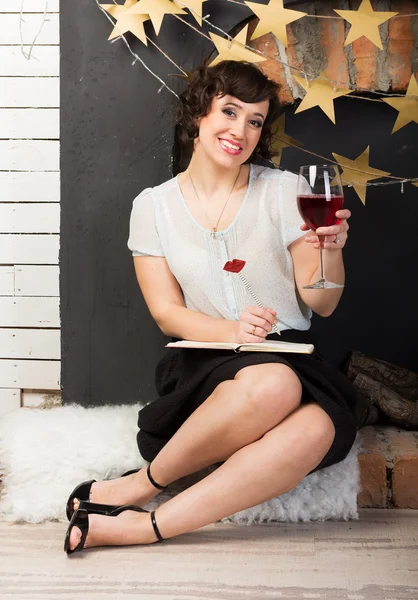 Woman with a glass of wine — Stock Photo, Image