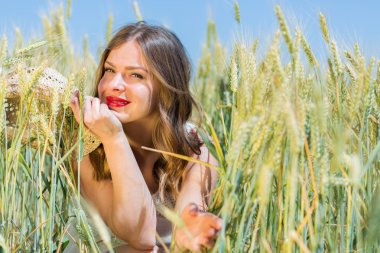 Happy girl in the summer field