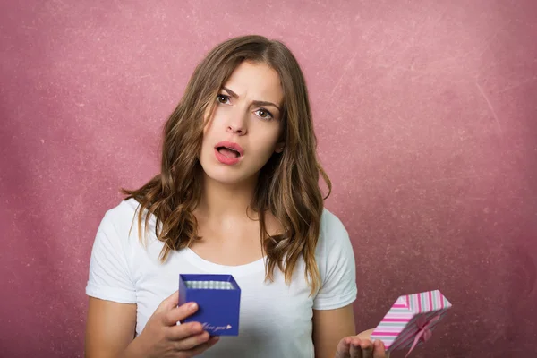 Beautiful girl with a gift box — Stock Photo, Image