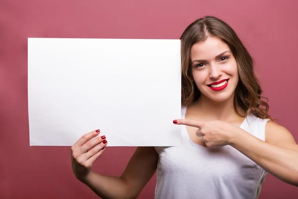 Beautiful woman holding a banner — Stock Photo, Image