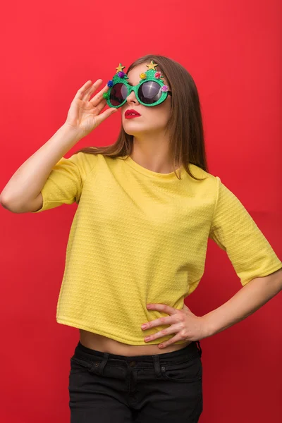Woman with Christmas party glasses — Stock Photo, Image