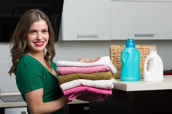 Woman doing laundry — Stock Photo, Image