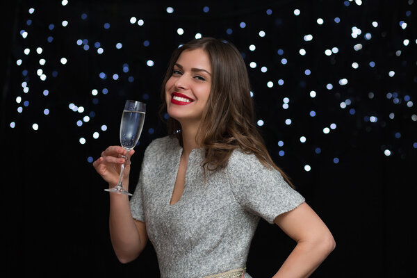 Woman with a glass of champagne