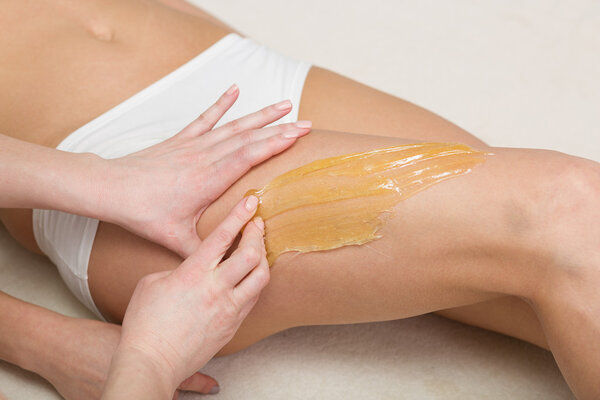 Sugaring beauty treatment