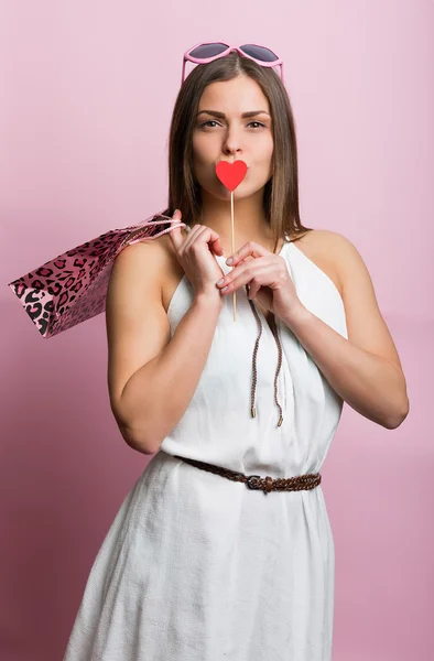 Mujer bonita con una bolsa de compras —  Fotos de Stock