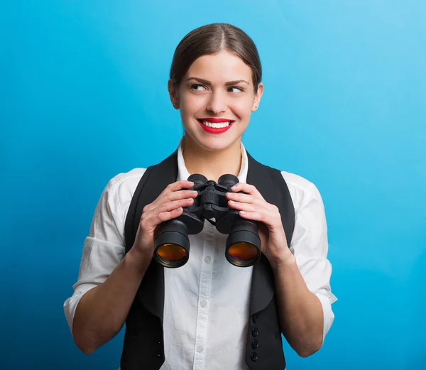 Business woman with a binoculars — Stock Photo, Image