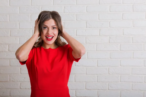 Beautiful woman in red dress — Stock Photo, Image