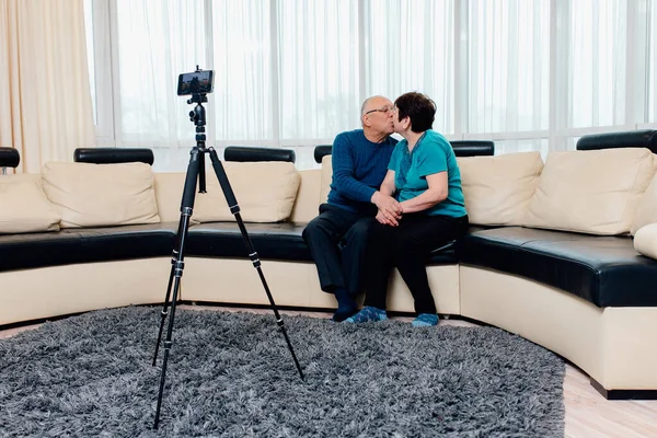 Elderly families by recording videos for broadcast in the social world. Happy family activity together