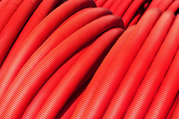 Tubes. Tuyau de plomberie rouge close-up . — Photo