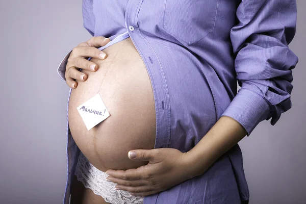 Pregnant Woman with sticker written  boy word in Russian — Stock Photo, Image