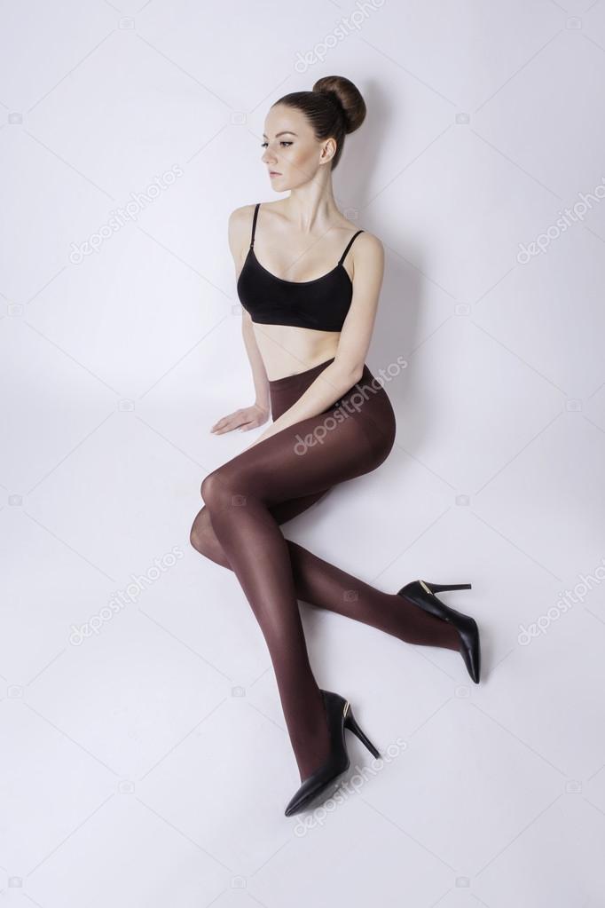 beautiful woman with long sexy legs in stockings 